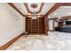 Built-in bookshelves in a basement area at 3229 Carmichael Pl, Duluth, GA 30097