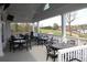 Covered clubhouse deck with golf course view at 3229 Carmichael Pl, Duluth, GA 30097