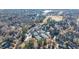 Aerial view of the community tennis courts, clubhouse, and pool at 3229 Carmichael Pl, Duluth, GA 30097