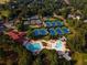 Aerial view of the community tennis courts, pool, and water park at 3229 Carmichael Pl, Duluth, GA 30097