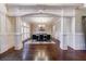 Elegant dining room with chandelier, large table, and hardwood floors at 3229 Carmichael Pl, Duluth, GA 30097