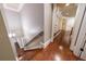 Hallway with hardwood floors, white trim, and built-in bookcase at 3229 Carmichael Pl, Duluth, GA 30097
