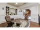 Second-story hallway sitting area with built-in bookcases and a view of the foyer at 3229 Carmichael Pl, Duluth, GA 30097