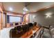 Home theater with a large screen, plush seating, and warm lighting at 3229 Carmichael Pl, Duluth, GA 30097