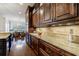 Spacious kitchen featuring granite countertops, ample cabinetry, and stainless steel appliances at 3229 Carmichael Pl, Duluth, GA 30097