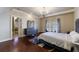 Large main bedroom with ensuite bathroom and hardwood floors at 3229 Carmichael Pl, Duluth, GA 30097