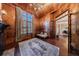 Inviting home office with fireplace, bookshelves, and a view to the dining room at 3229 Carmichael Pl, Duluth, GA 30097