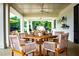 Covered outdoor dining area overlooking the pool at 3229 Carmichael Pl, Duluth, GA 30097
