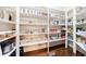 Well-organized pantry with ample shelving and storage space at 3229 Carmichael Pl, Duluth, GA 30097