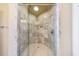 Spacious tiled shower with glass enclosure and multiple shower heads at 3229 Carmichael Pl, Duluth, GA 30097