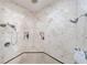Large tiled shower with dual shower heads, built-in niches, and mosaic tile accents at 3229 Carmichael Pl, Duluth, GA 30097