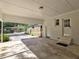 Covered carport with concrete flooring and access to the backyard at 2515 Stonington Rd, Dunwoody, GA 30338