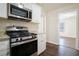 Modern kitchen with stainless steel appliances and granite countertops at 3152 Robin Rd, Decatur, GA 30032