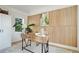 Home office with wood desk, bamboo wall, and natural light at 2106 Cloverdale, Atlanta, GA 30316