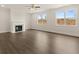 Living room features hardwood floors and a fireplace at 3862 Kastler Dr, South Fulton, GA 30349