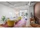 Bright living room with hardwood floors and modern furniture at 800 Peachtree Ne St # 1410, Atlanta, GA 30308