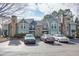 Two-story building exterior with light green siding and stone accents at 1019 Canyon Point Cir, Roswell, GA 30076