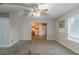 Spacious living room with carpet and a view of the kitchen at 2720 Thornbury Way, Atlanta, GA 30349