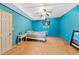Brightly-colored bedroom in the basement with a ceiling fan and ample space at 680 Horsley Mill Rd, Carrollton, GA 30116