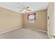 Cozy bedroom with neutral walls, carpeted floors, and ceiling fan at 680 Horsley Mill Rd, Carrollton, GA 30116