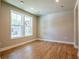 Bonus room with wood floors and several windows at 4162 Adler Cir, Buford, GA 30519