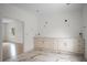 Bathroom with vanity, marble tile floor, and gold fixtures at 5995 Riverside Dr, Atlanta, GA 30328