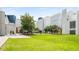 Museum courtyard with green space, trees, and visitors enjoying the outdoors at , Atlanta, GA 30309