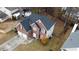 Brick and siding two-story home with a two-car garage at 1547 Welch Ct, Suwanee, GA 30024