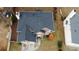 Aerial view of home's roof, showing its condition and surrounding trees at 1547 Welch Ct, Suwanee, GA 30024