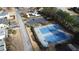 Aerial view of community tennis courts and parking area at 1547 Welch Ct, Suwanee, GA 30024