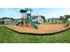 Community playground with slides, swings, and benches at 2560 Quarterdeck Dr, Cumming, GA 30041