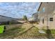 Fenced backyard with patio and grassy area at 5537 Union Pointe Pl, Union City, GA 30291