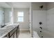 Clean bathroom with tub, shower, and vanity at 5537 Union Pointe Pl, Union City, GA 30291