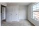 Bright bedroom with double doors and window at 5537 Union Pointe Pl, Union City, GA 30291