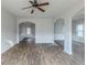 Spacious living room with hardwood floors and an open floor plan at 5537 Union Pointe Pl, Union City, GA 30291