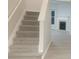 Elegant staircase leading to the upper level at 1909 Granville Dr, Lawrenceville, GA 30043