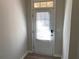 Interior front entry with white door and blinds at 3372 Baylor Cir, Mcdonough, GA 30253