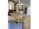 Spacious kitchen with granite countertops and island at 1276 Huntington Place Cir, Lithonia, GA 30058