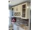 Kitchen with custom cabinetry and wine rack at 1276 Huntington Place Cir, Lithonia, GA 30058