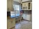 Eat-in kitchen with granite countertops and custom cabinetry at 1276 Huntington Place Cir, Lithonia, GA 30058