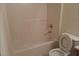 Simple, clean bathroom with tub/shower combo, toilet, and tile flooring at 2800 Vining Ridge Ter, Decatur, GA 30034