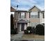 Attractive two-story townhome with a welcoming front entrance and landscaped shrubs at 2920 Vining Ridge Ter, Decatur, GA 30034