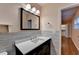 Updated bathroom with vanity, modern fixtures, and tiled walls at 3479 Chestnut Dr, Atlanta, GA 30340