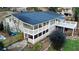 Aerial view of the home's exterior, featuring a deck and screened porch at 3479 Chestnut Dr, Atlanta, GA 30340