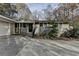 Inviting home exterior with covered entryway and attached garage at 3479 Chestnut Dr, Atlanta, GA 30340