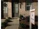 Front exterior of a two-story home at night with a for sale sign at 3963 Allegretto Cir, Atlanta, GA 30339