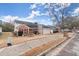 Street view of the front exterior highlighting the home's curb appeal and landscaped front yard at 4907 Wilkins Station Dr, Decatur, GA 30035