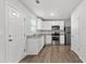 Kitchen with white shaker cabinets, granite countertops, and stainless steel appliances at 7264 Crestside Dr, Austell, GA 30168