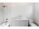 Modern bathroom with marble vanity and tiled shower at 3707 Randall Mill Nw Rd, Atlanta, GA 30327