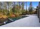 Modern infinity pool with large patio at 3707 Randall Mill Nw Rd, Atlanta, GA 30327